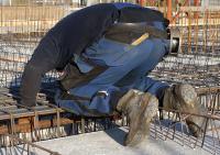 bouwplaats: vlechters en installateurs 2e verdiepingsvloer