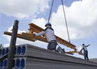 bouwplaats: voorbereiding wandstort en kanaalplaat-elementen leggen