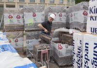 bouwplaats: metselaars en Braziliaans metselwerk